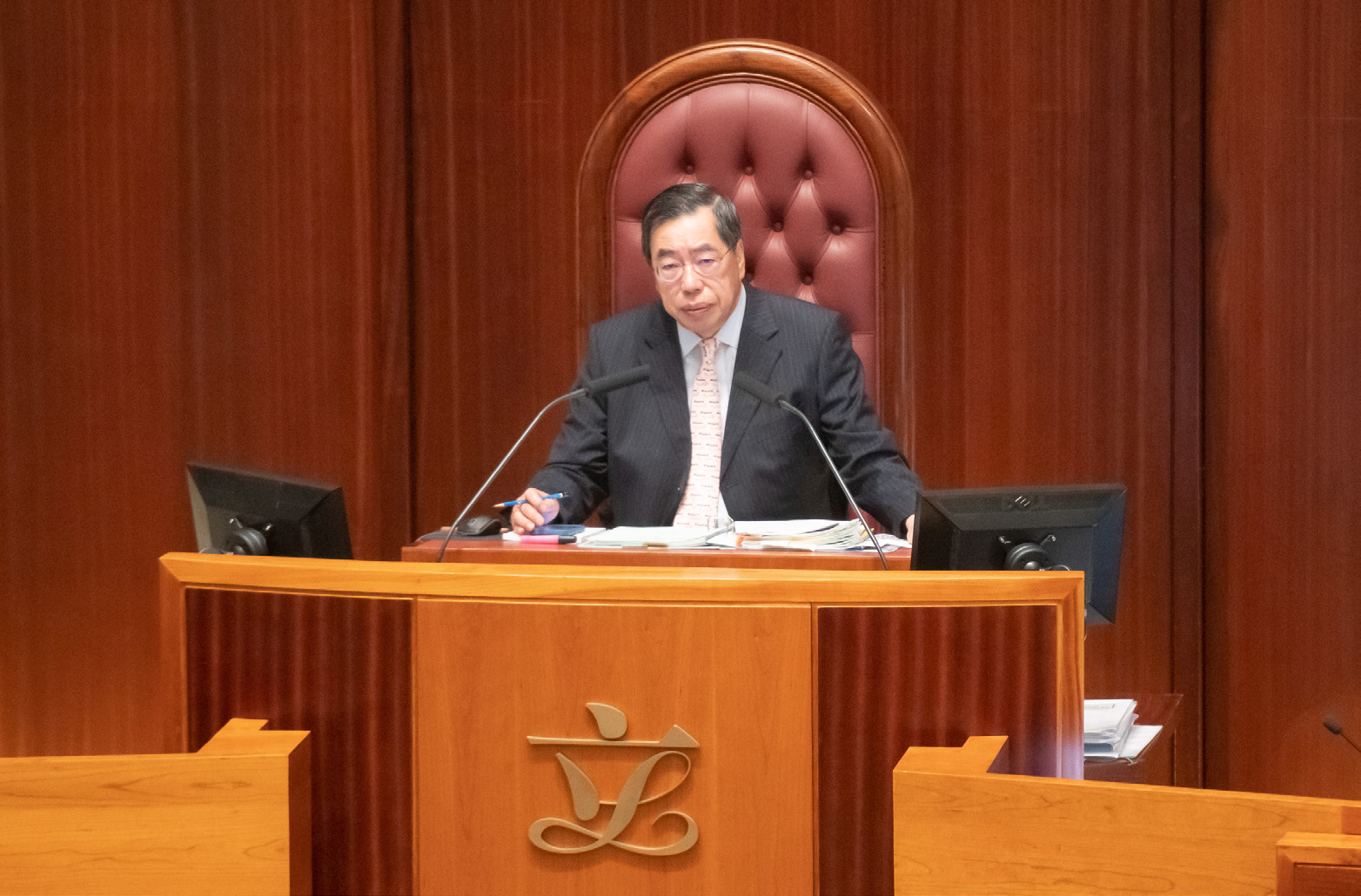 The President of the Seventh Legislative Council, Hon Andrew LEUNG Kwan-yuen, presiding over a Council meeting
