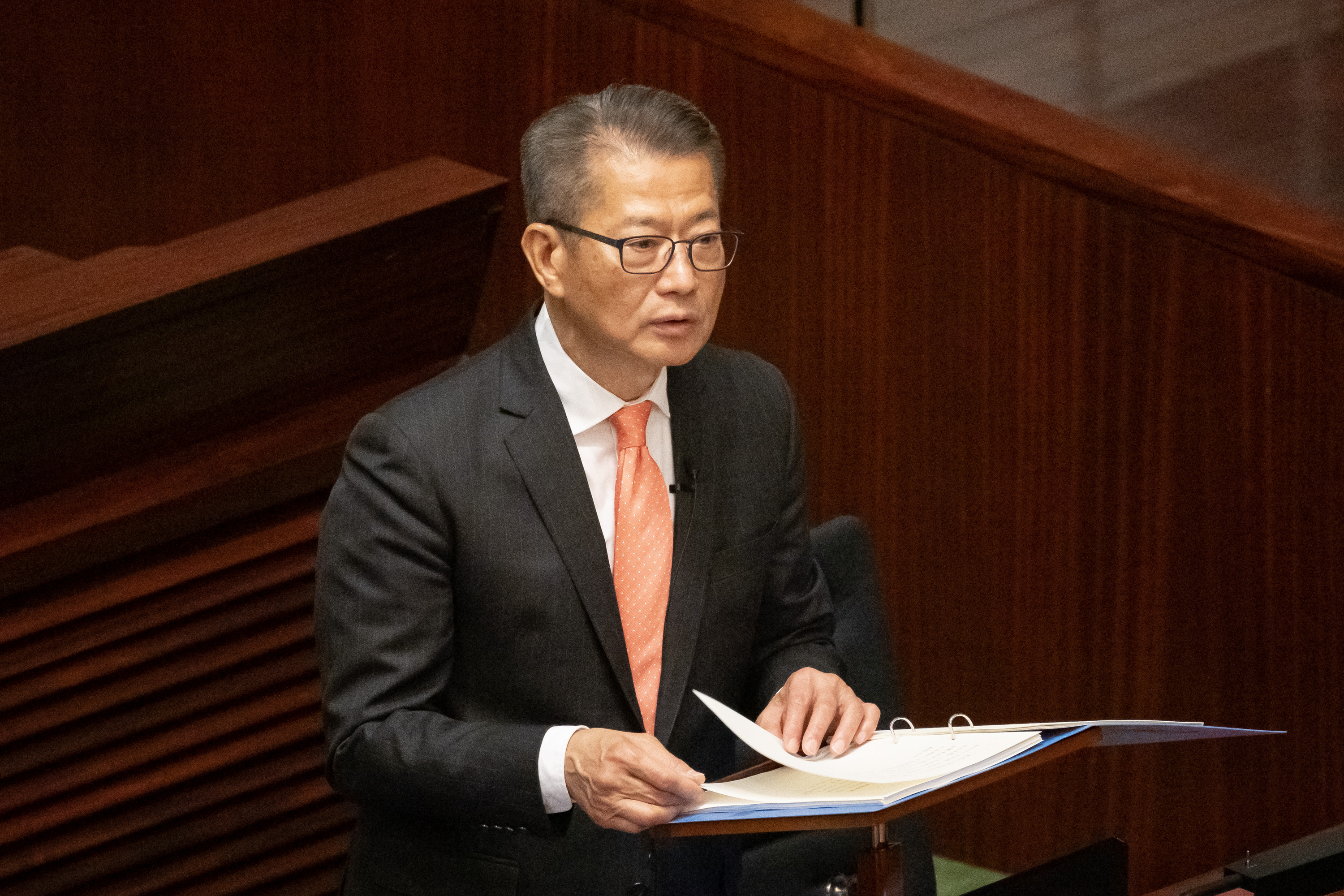 The Financial Secretary Mr Paul CHAN Mo-po delivers the annual Budget Speech at the Council meeting